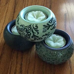 Set of three tea light holders